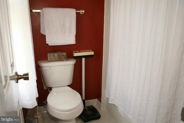 13130 Brandon Way Road Gaithersburg, MD 20878 - Photo 17 of 26 a white toilet sitting next to a small sink