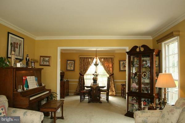13130 Brandon Way Road Gaithersburg, MD 20878 - Photo 3 of 26 a view of a livingroom with furniture and a window