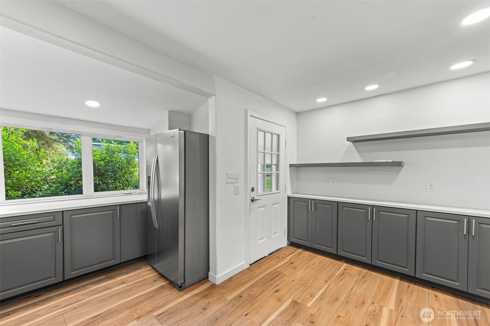 172 South Bank Road Elma, WA 98541 - Photo 12 of 40 a view of kitchen with wooden floor and electronic appliances