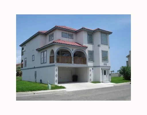 a white building with a outdoor space