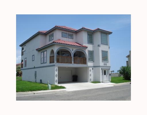 a white building with a outdoor space