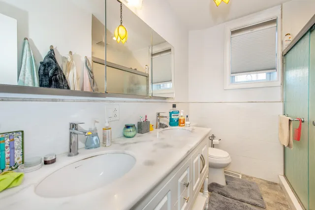 a bathroom with a sink and a toilet