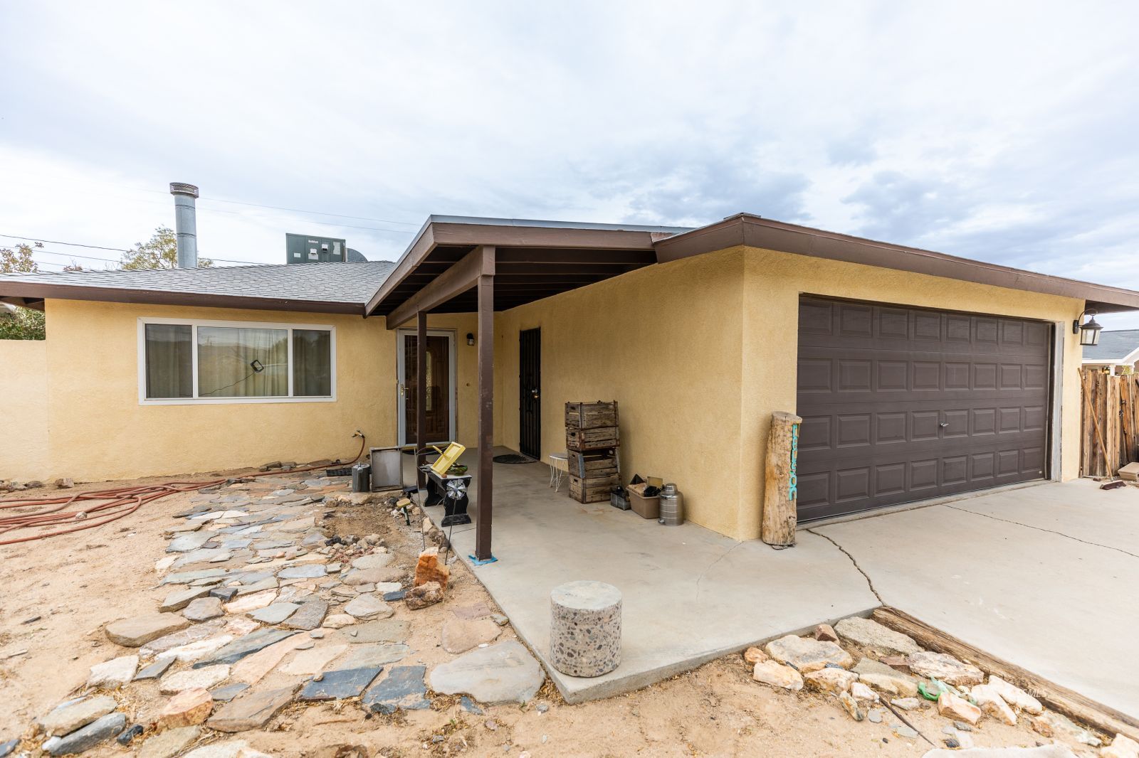 930 West Vulcan Avenue Ridgecrest, CA 93555 - Photo 2 of 19 a view of a house with a patio