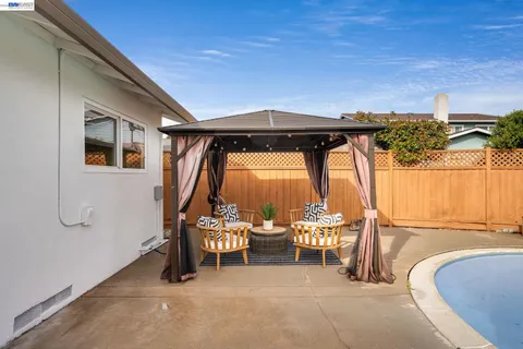 a room with gym equipment and a large window