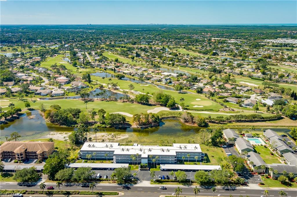 5515 Rattlesnake Hammock Road, Unit 205 Naples, FL 34113 - Photo 2 of 46 a view of a city