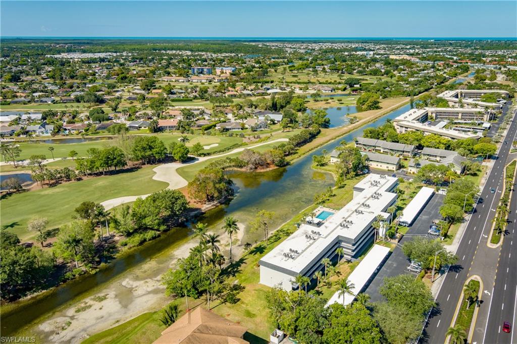 5515 Rattlesnake Hammock Road, Unit 205 Naples, FL 34113 - Photo 33 of 46 an aerial view of residential houses with outdoor space