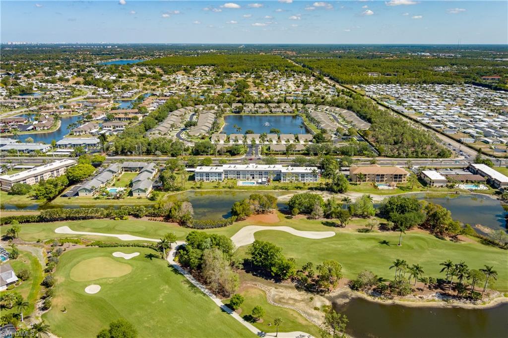 5515 Rattlesnake Hammock Road, Unit 205 Naples, FL 34113 - Photo 40 of 46 a view of a city with an ocean