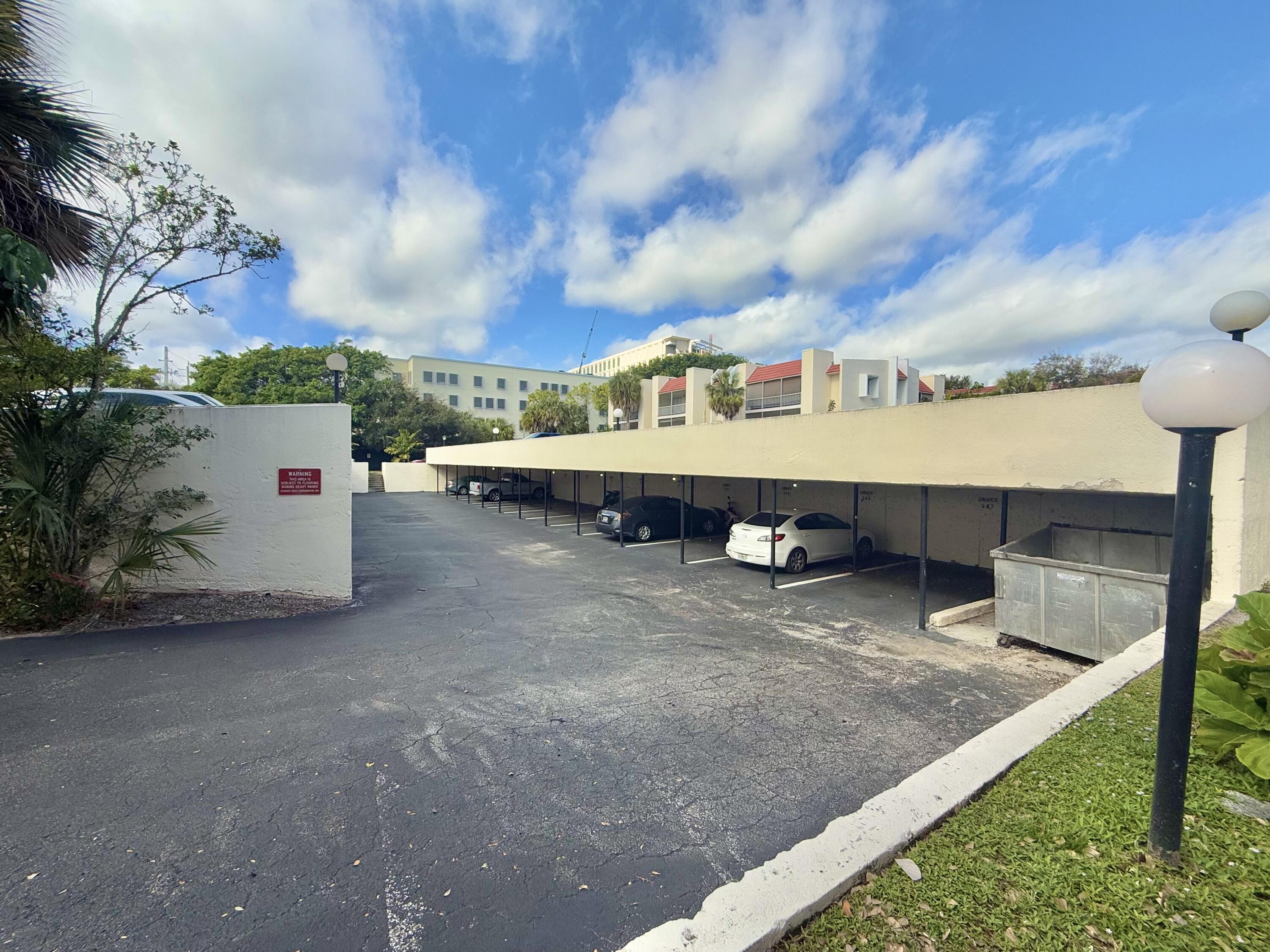 636 Northwest 13th Street, Unit 31 Boca Raton, FL 33486 - Photo 28 of 32 THREE COVERED PARKING SPOTS