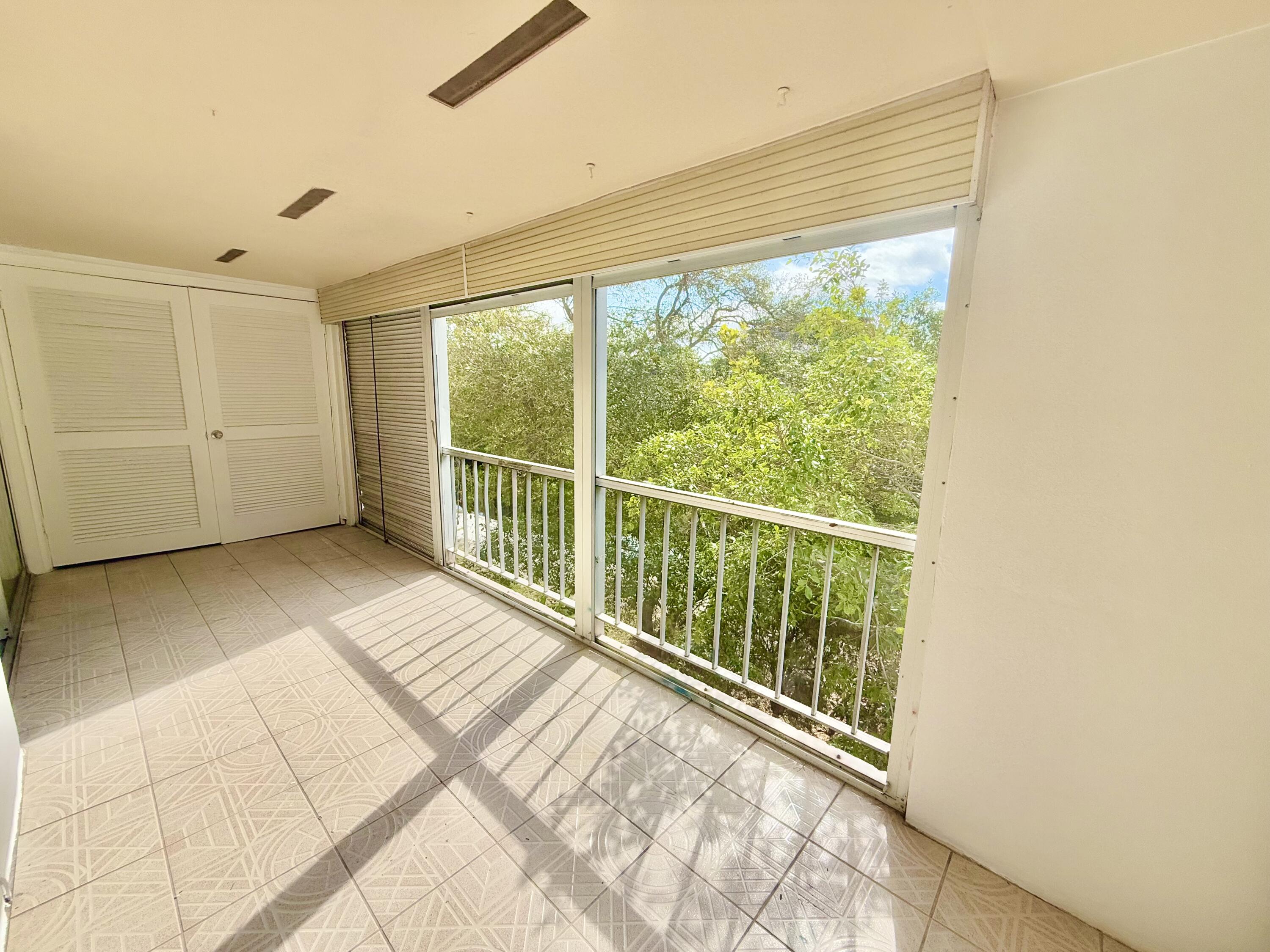 636 Northwest 13th Street, Unit 31 Boca Raton, FL 33486 - Photo 4 of 32 Oversized balcony
