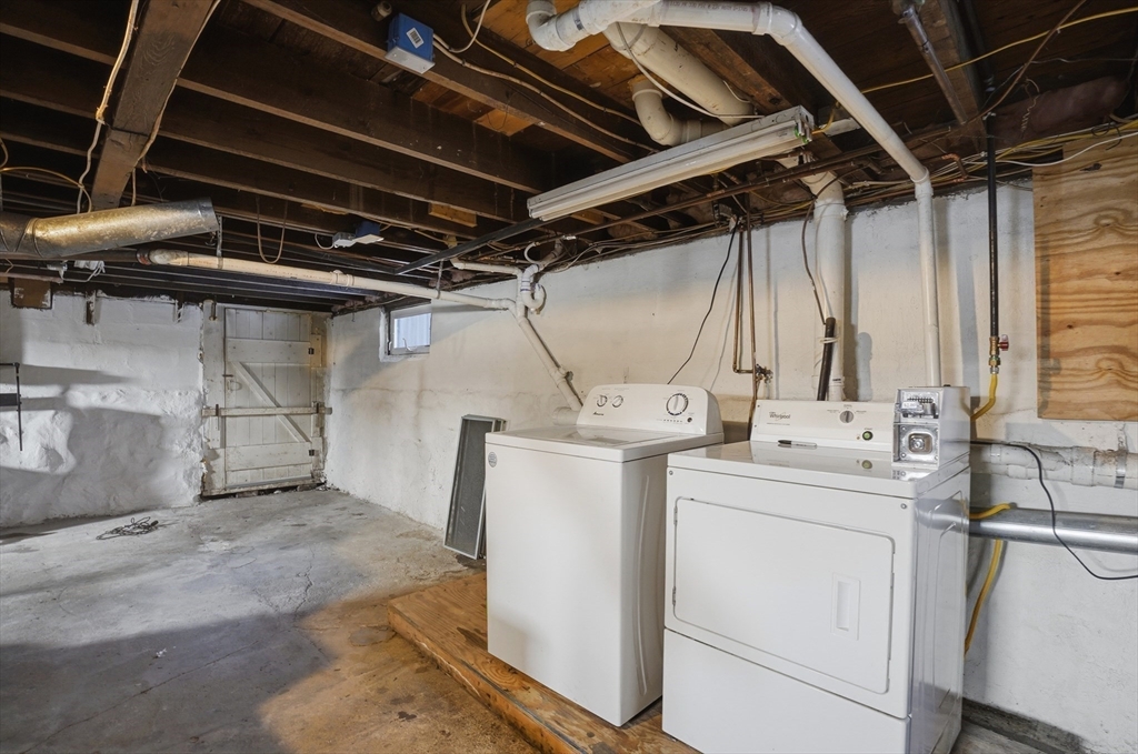 55 Addison Avenue Lynn, MA 01902 - Photo 19 of 23 a utility room with dryer and washer