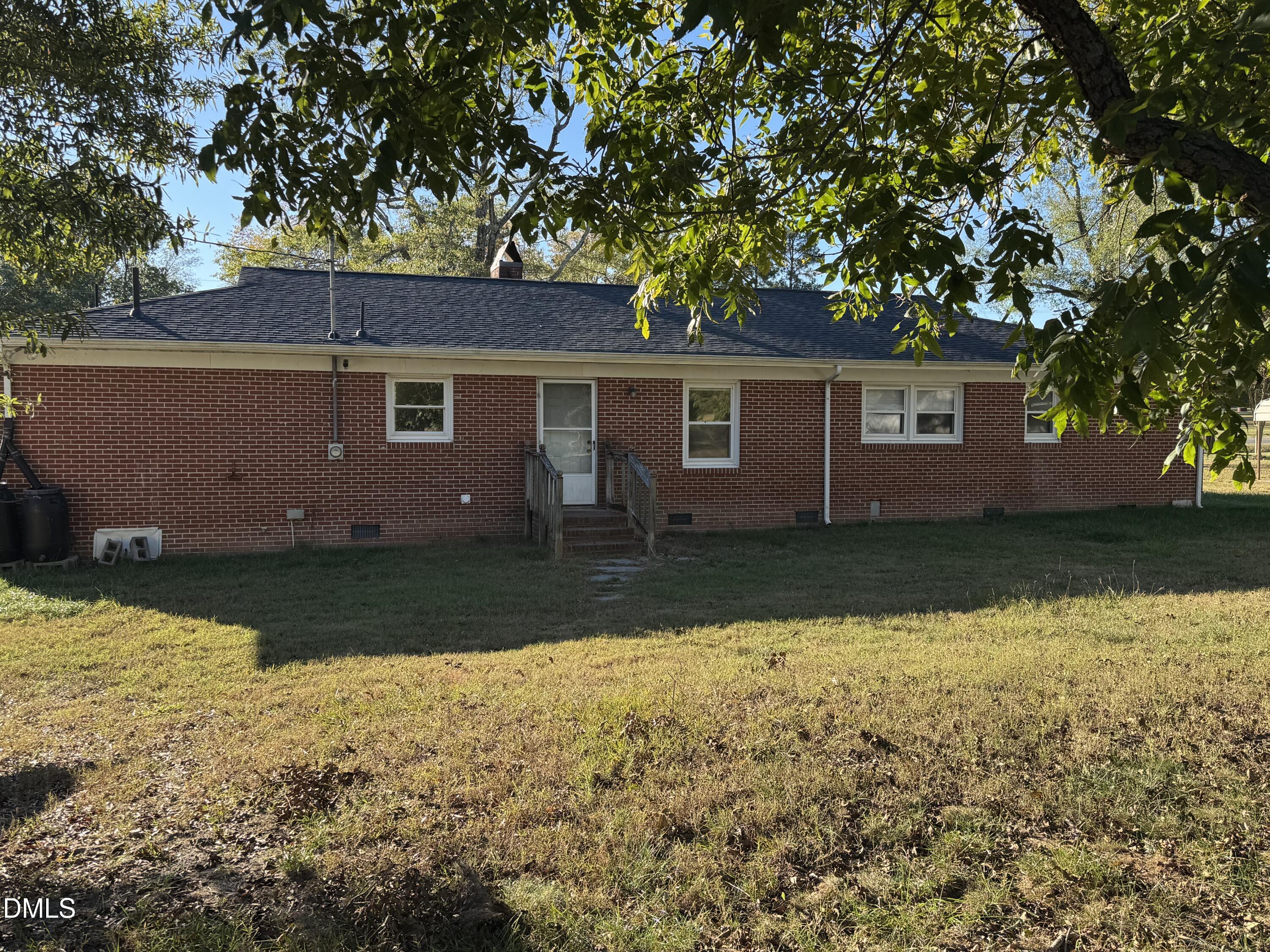 15008 Creedmoor Road Wake Forest, NC 27587 - Photo 13 of 14 front view of house with yard