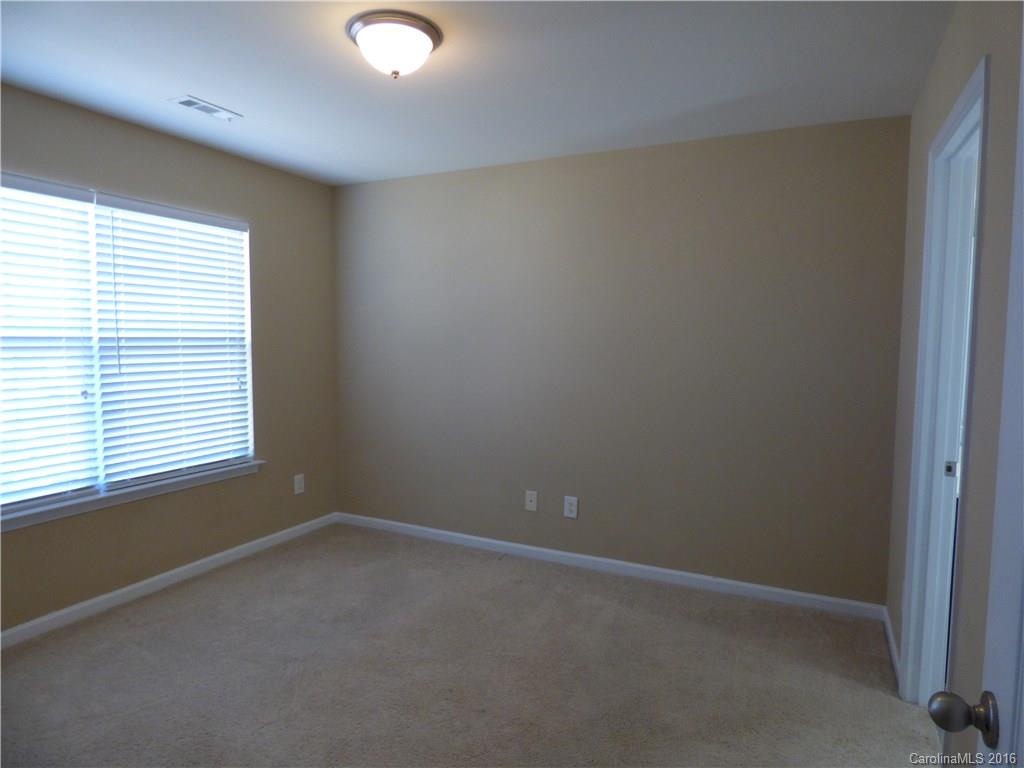 1249 Afternoon Sun Road Matthews, NC 28104 - Photo 18 of 20 an empty room with a window