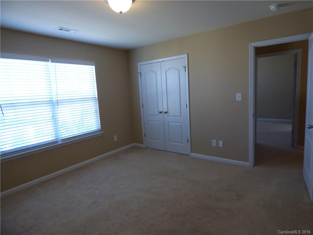 1249 Afternoon Sun Road Matthews, NC 28104 - Photo 20 of 20 an empty room with a window