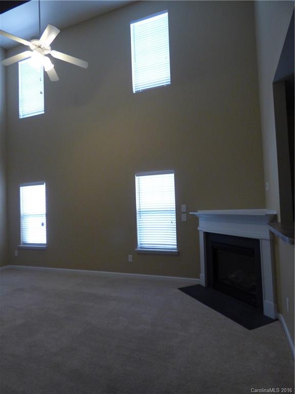 1249 Afternoon Sun Road Matthews, NC 28104 - Photo 3 of 20 a view of an empty room with a window