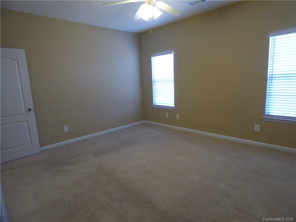 1249 Afternoon Sun Road Matthews, NC 28104 - Photo 10 of 20 an empty room that has a window
