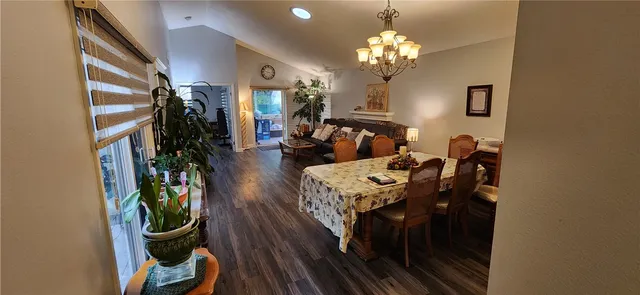 a bedroom with a bed and a lamp