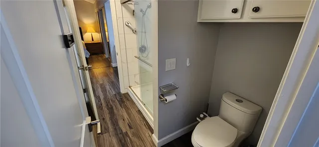 a bathroom with a sink a mirror and a shower
