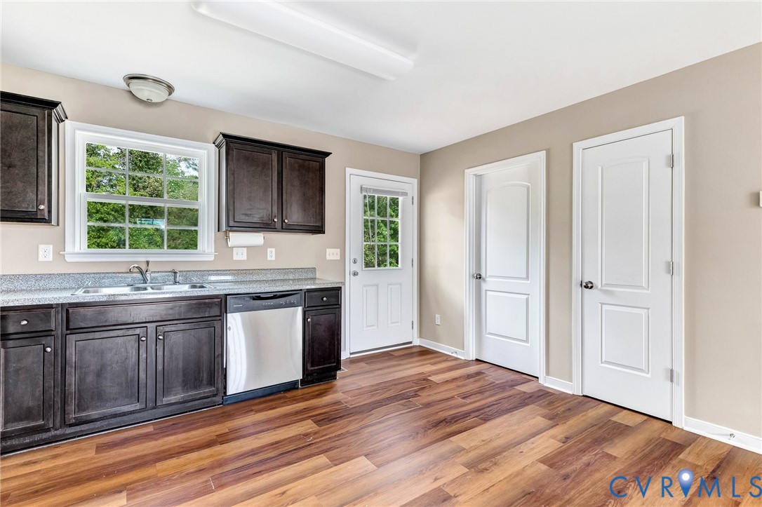9925 Reymet Court Richmond, VA 23237 - Photo 11 of 30 a kitchen with granite countertop cabinets stainless steel appliances and a sink