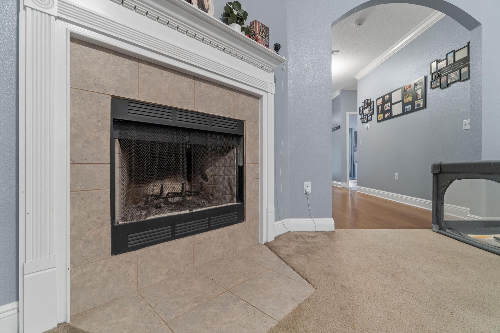 641 Red Fern Road Crestview, FL 32536 - Photo 15 of 33 a view of a livingroom with a fireplace