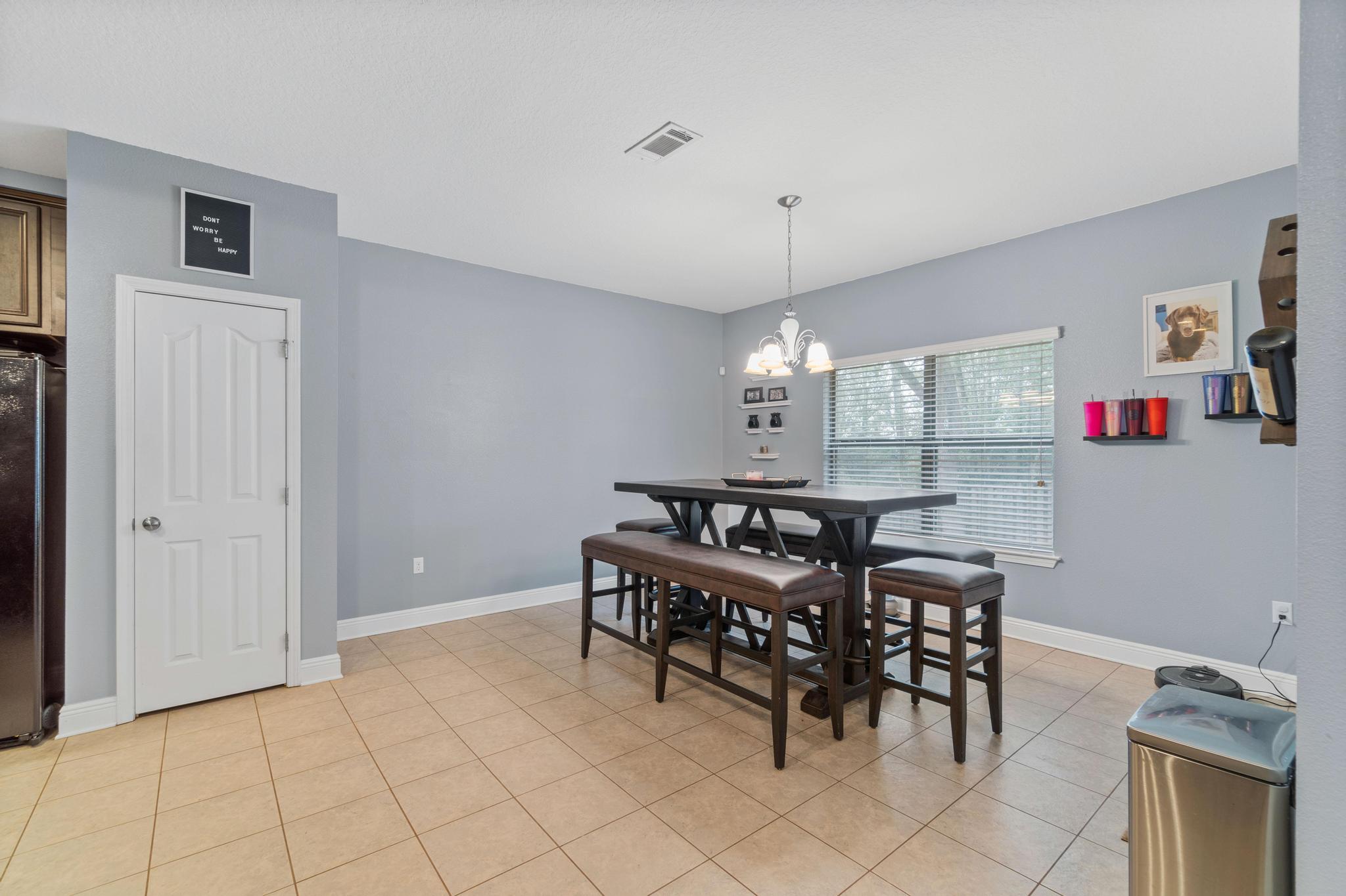 641 Red Fern Road Crestview, FL 32536 - Photo 16 of 33 a view of a dining room with furniture