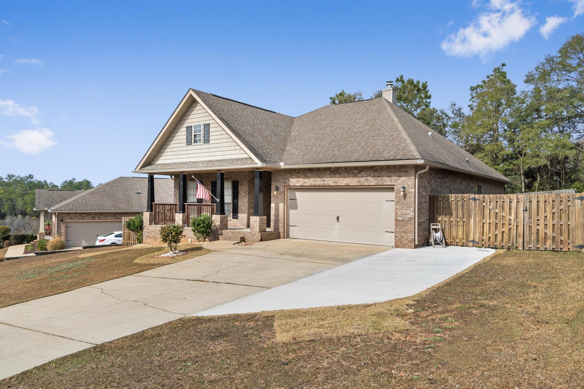 641 Red Fern Road Crestview, FL 32536 - Photo 2 of 33 a front view of a house with a yard