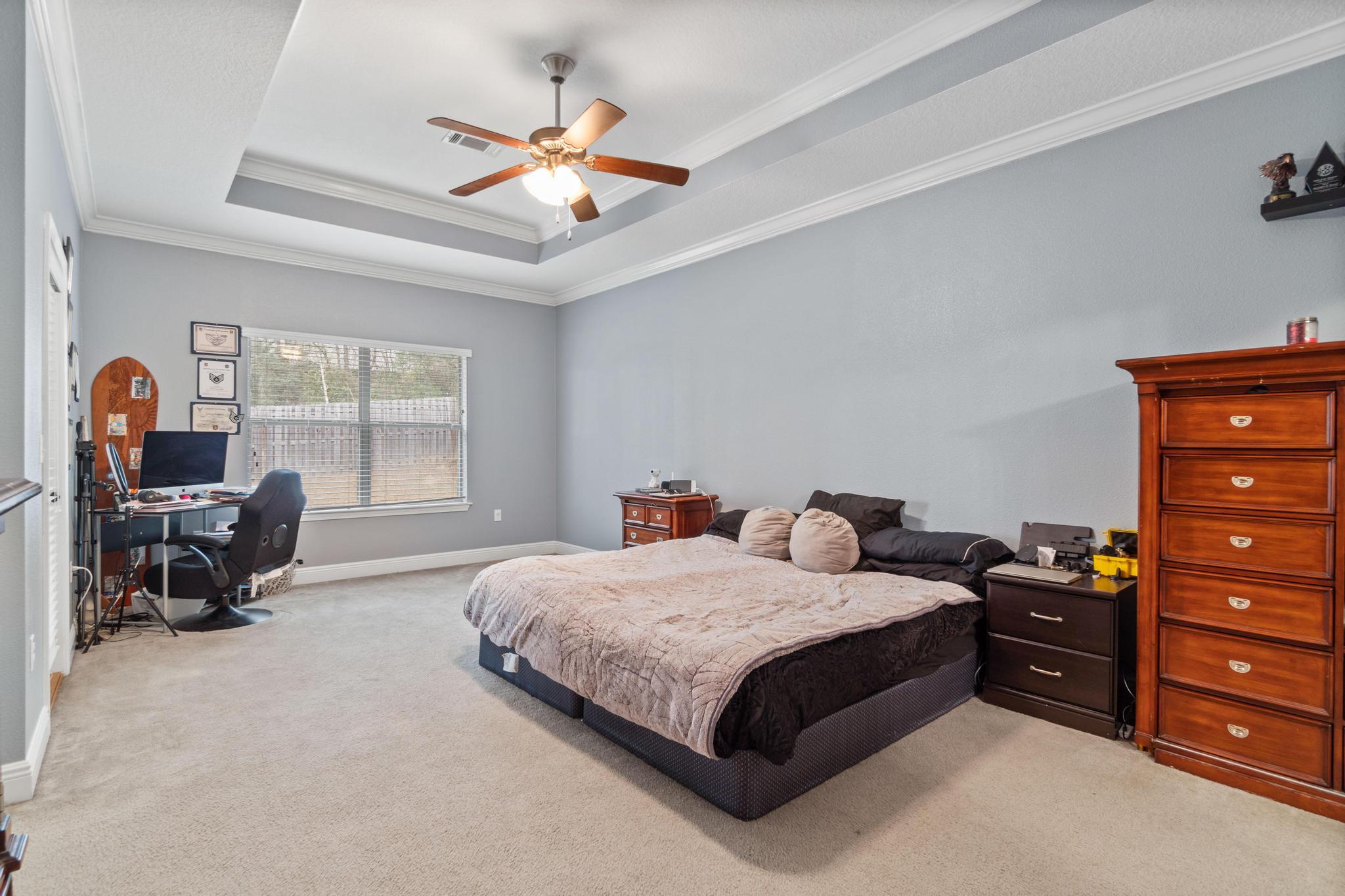 641 Red Fern Road Crestview, FL 32536 - Photo 22 of 33 a bedroom with a bed furniture and a window