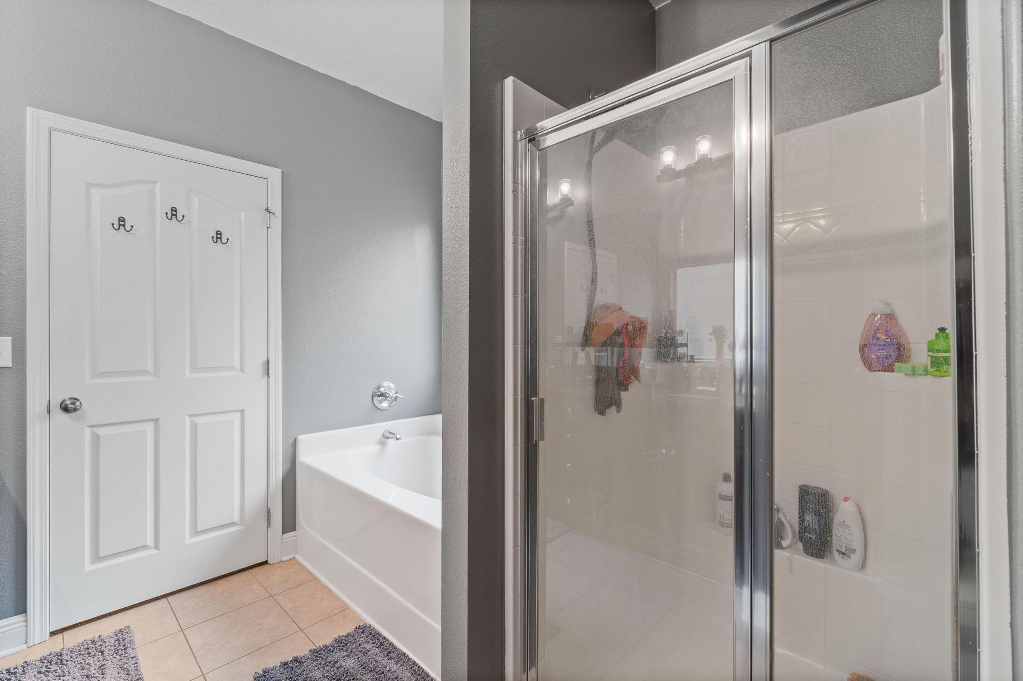 641 Red Fern Road Crestview, FL 32536 - Photo 25 of 33 a bathroom with a bathtub and shower
