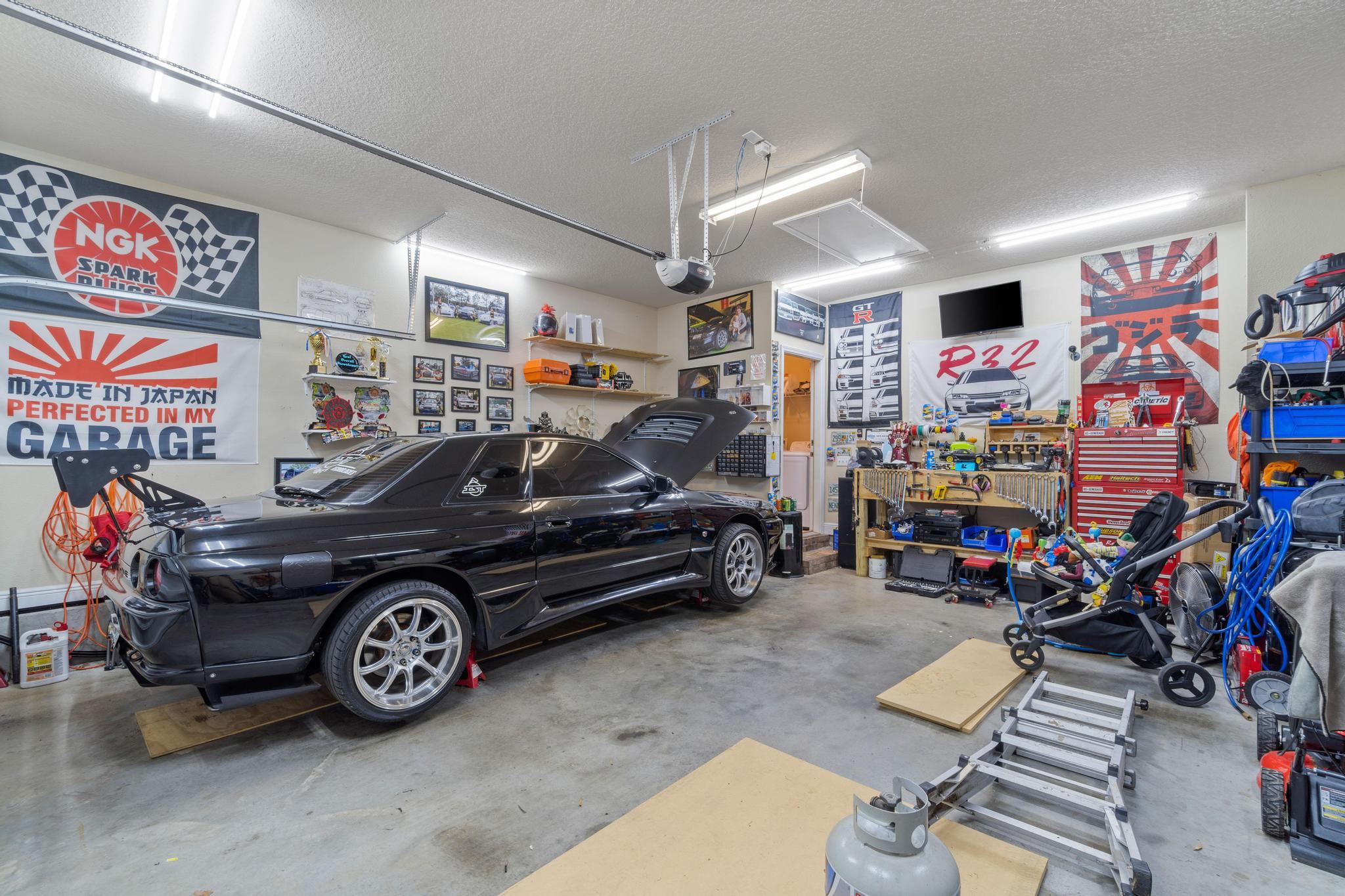 641 Red Fern Road Crestview, FL 32536 - Photo 28 of 33 a car parked in a garage