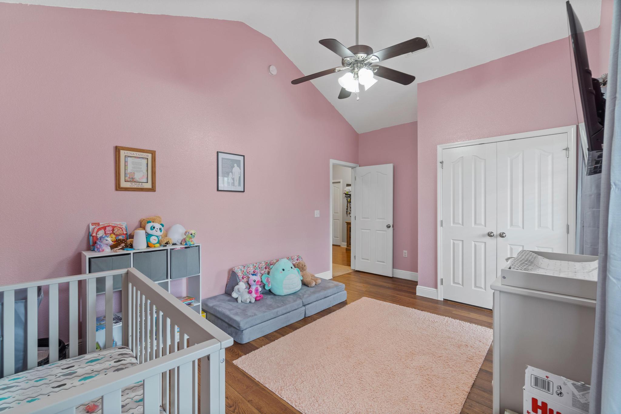 641 Red Fern Road Crestview, FL 32536 - Photo 8 of 33 a living room with furniture and a chandelier