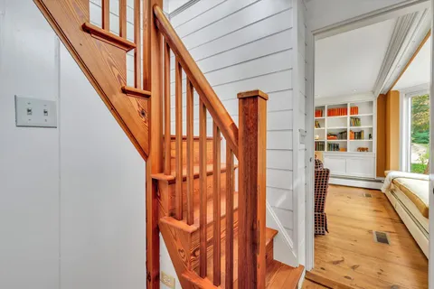 a kitchen with a sink and a large window