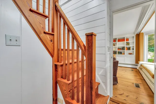 a kitchen with a sink and a large window