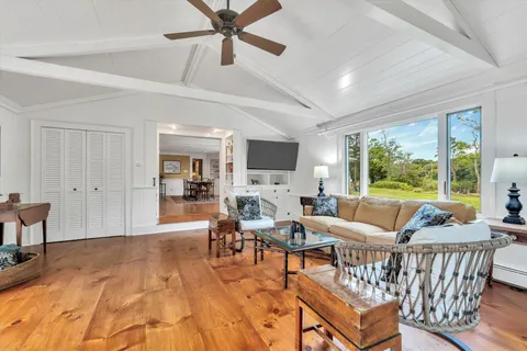 a kitchen with stainless steel appliances a sink and a refrigerator