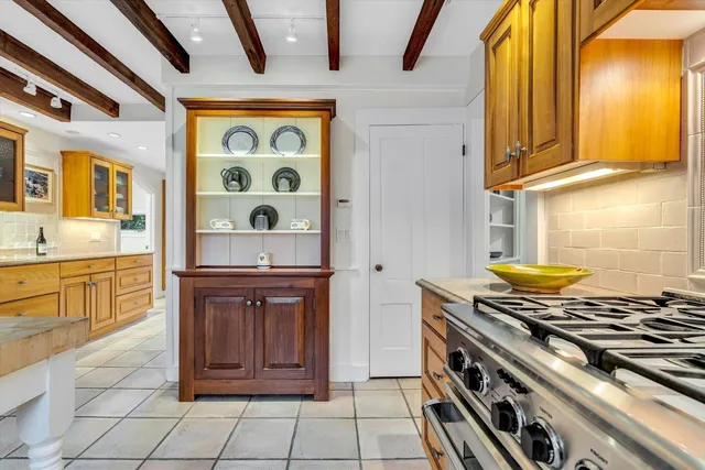 a view of a yard with large tree