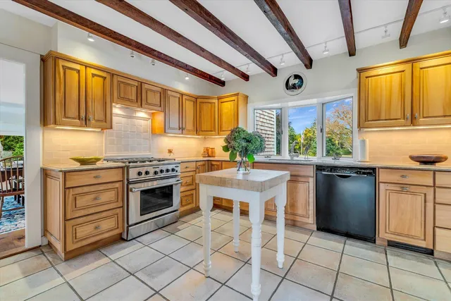 a view of a two chairs in a yard