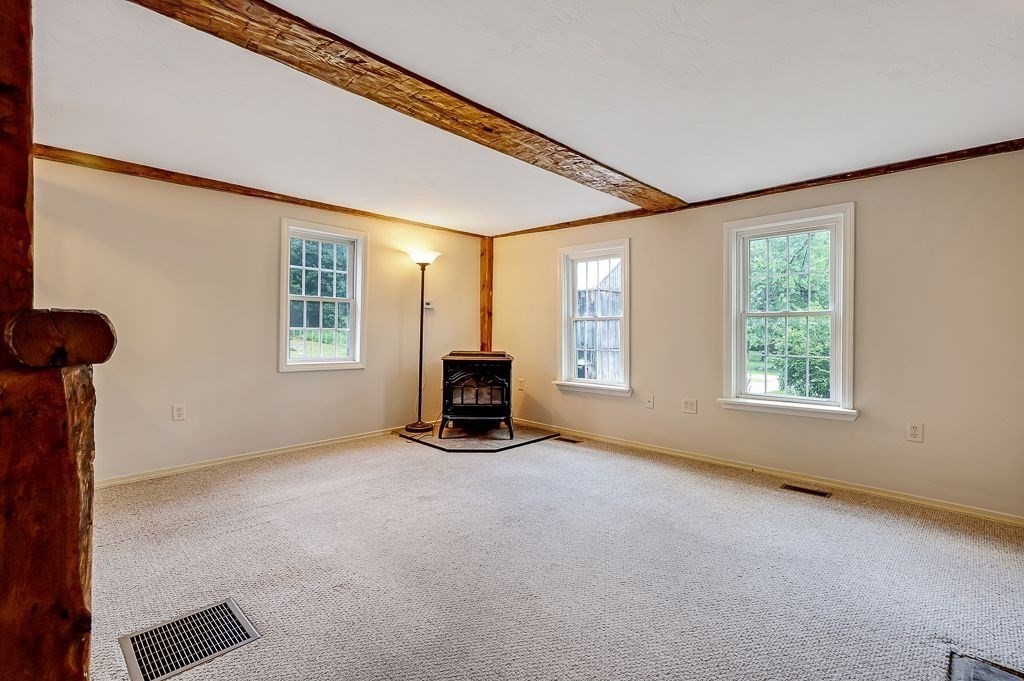 67 Stone School Road Sutton, MA 01590 - Photo 16 of 41 a view of an empty room with a window