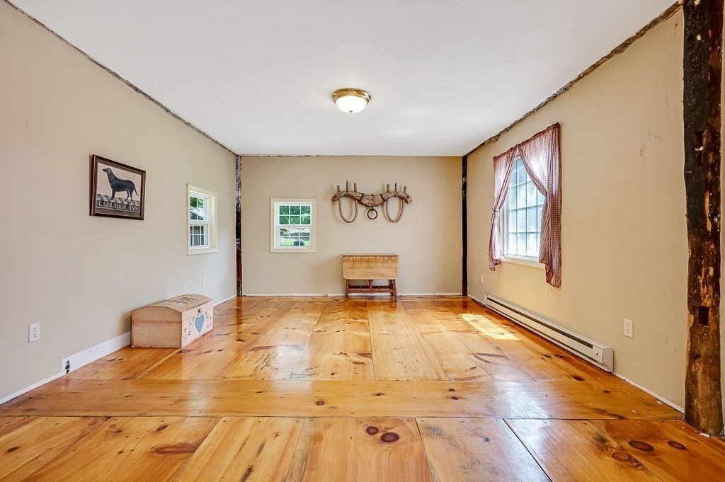 67 Stone School Road Sutton, MA 01590 - Photo 8 of 41 a view of an empty room with a window