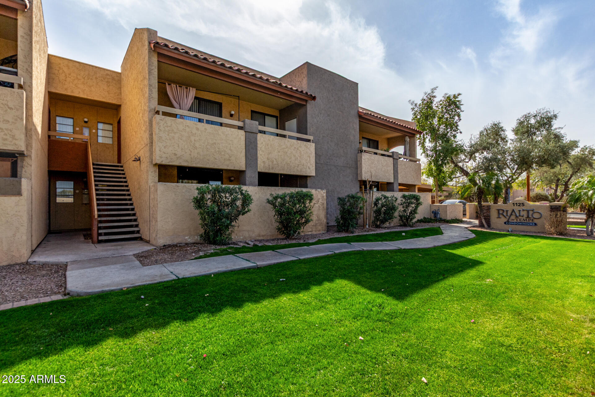 1125 East Broadway Road, Unit 102 Tempe, AZ 85282 - Photo 4 of 10 a view of a back yard of the house