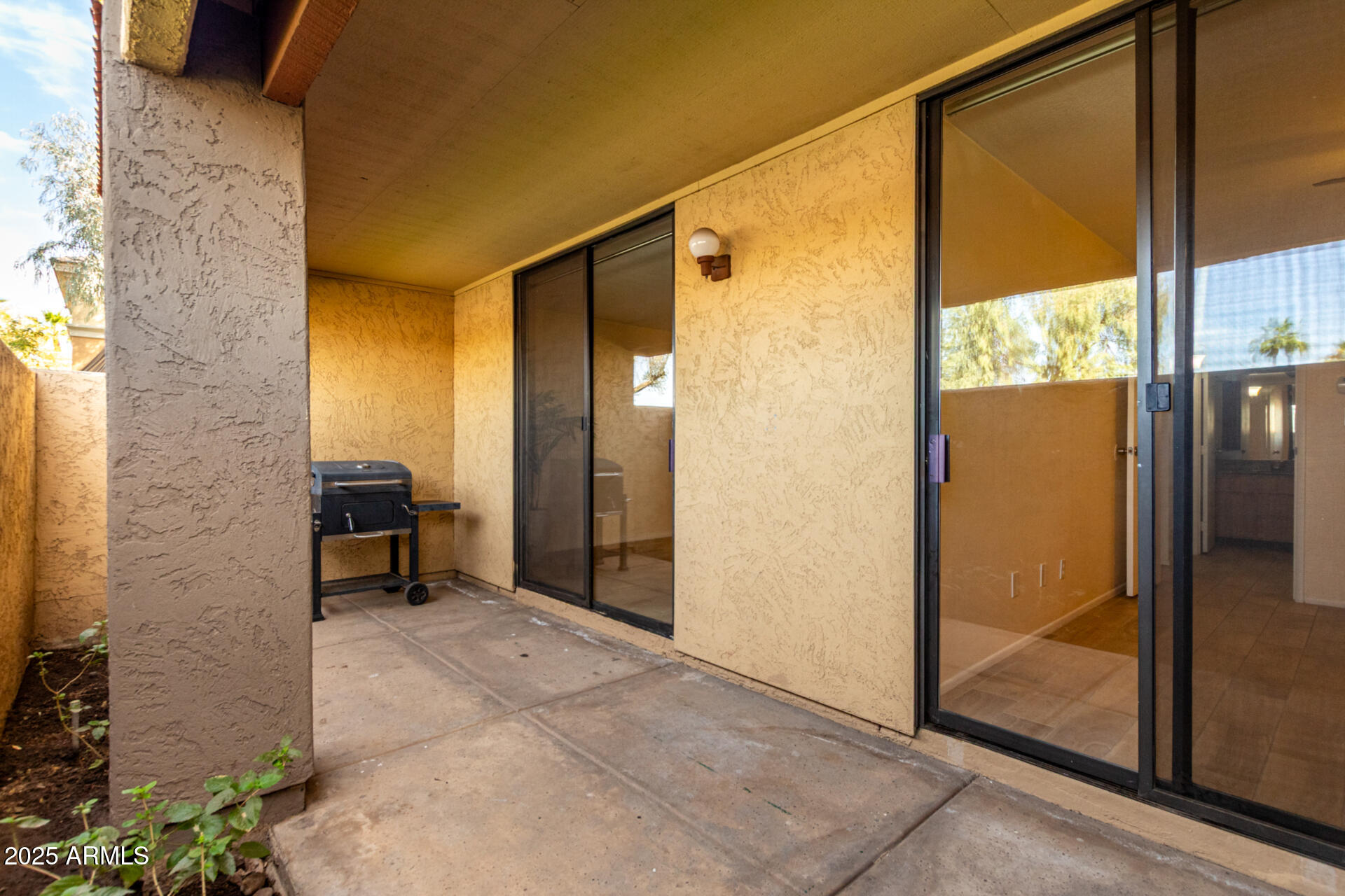 1125 East Broadway Road, Unit 102 Tempe, AZ 85282 - Photo 7 of 10 a view of a bathroom with a glass door