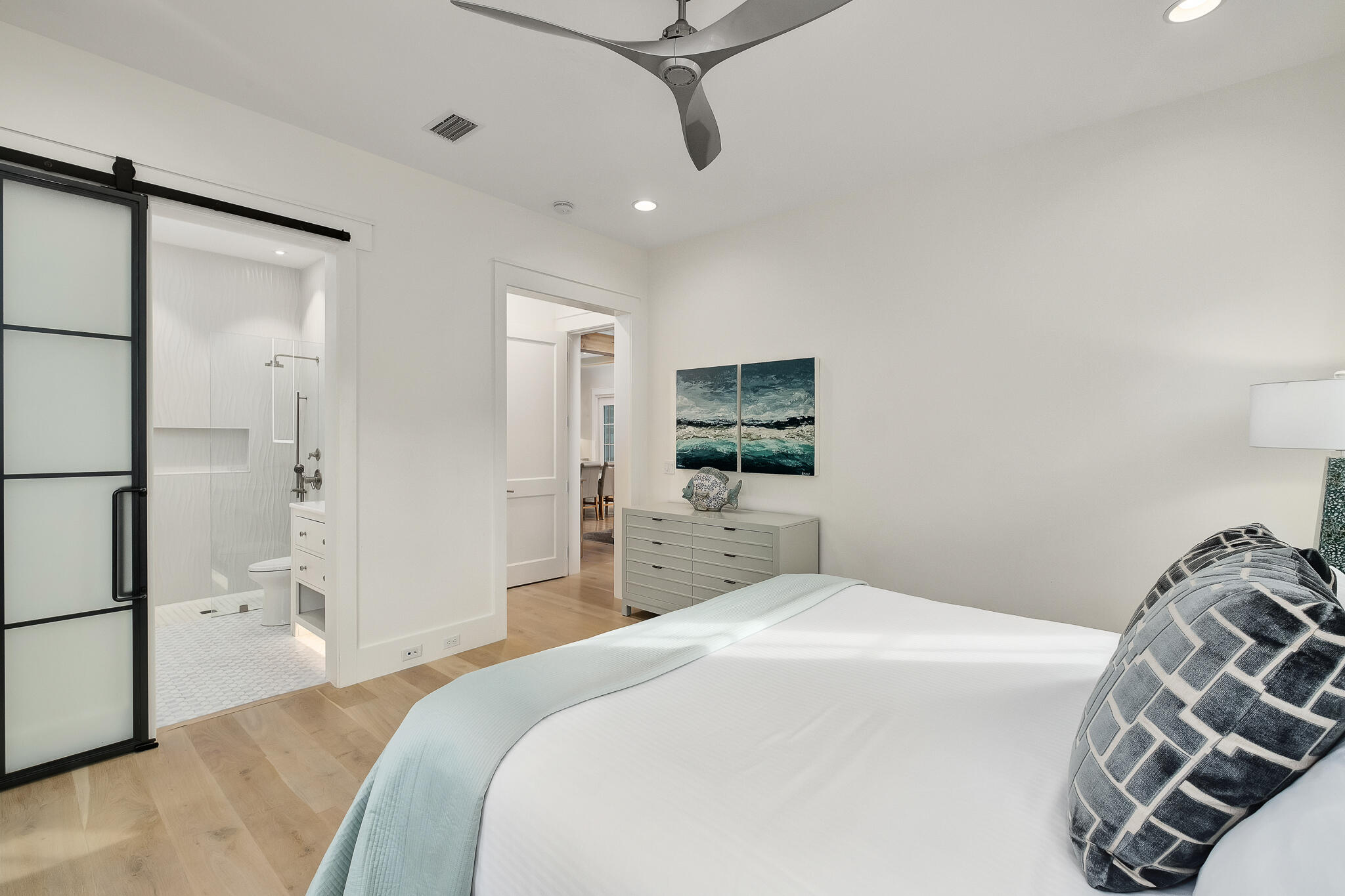 409 Coopersmith Lane Inlet Beach, FL 32461 - Photo 49 of 97 a bedroom with a bed and a mirror