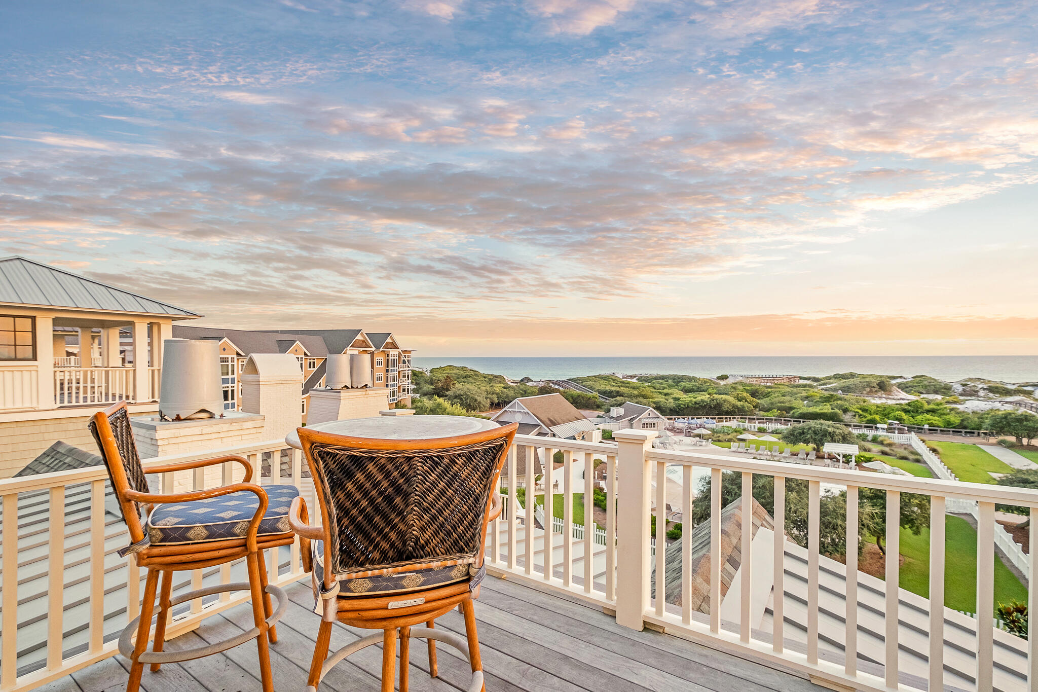 409 Coopersmith Lane Inlet Beach, FL 32461 - Photo 69 of 97 a view of a chairs and table on the deck