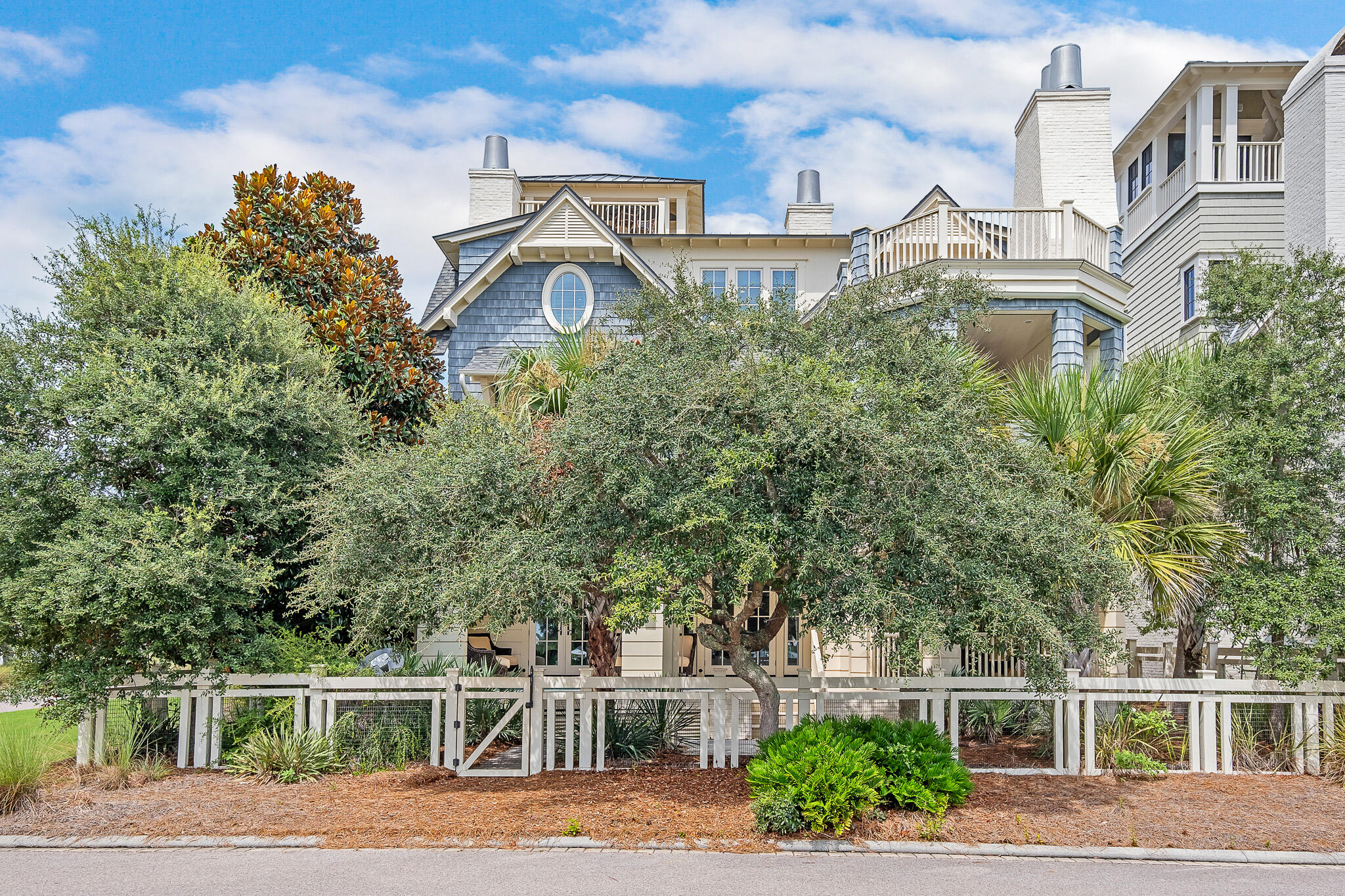409 Coopersmith Lane Inlet Beach, FL 32461 - Photo 97 of 97 a front view of a house with a garden