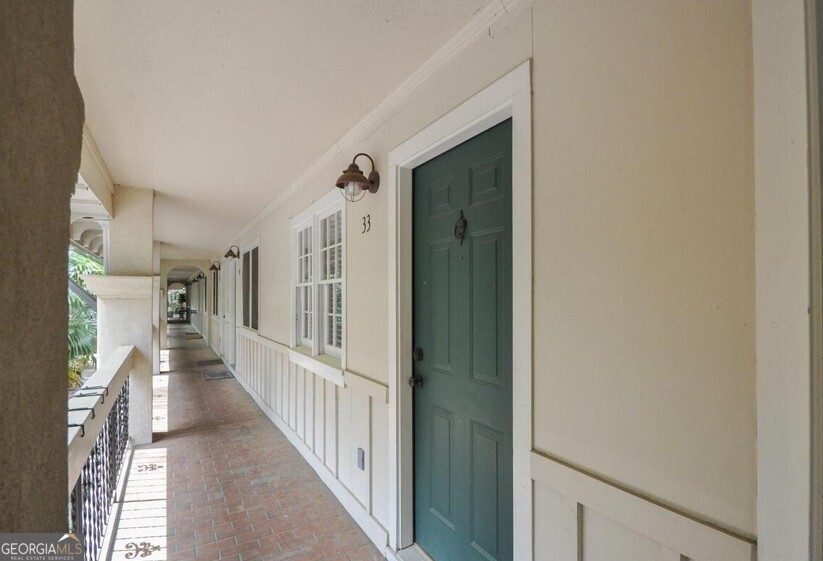 655 East Campus Road Athens, GA 30605 - Photo 3 of 13 a view of a hallway with wooden floor and staircase
