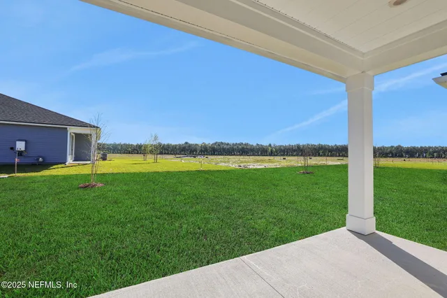a view of an outdoor space and a yard