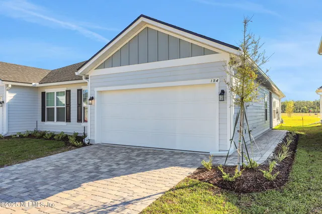 a house view with a outdoor space
