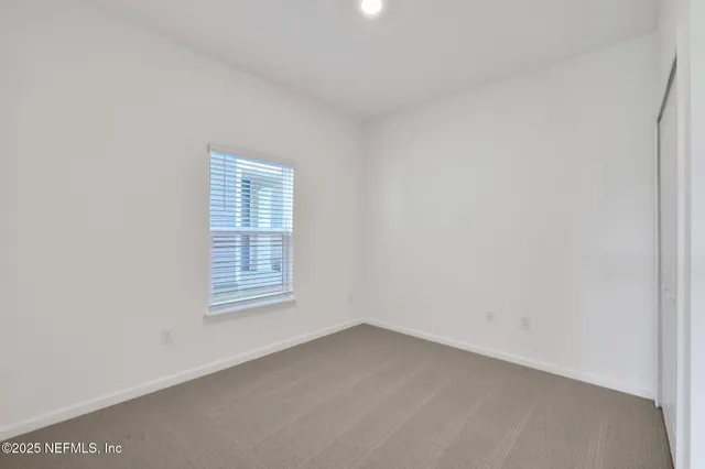 a bathroom with a sink a toilet and vanity