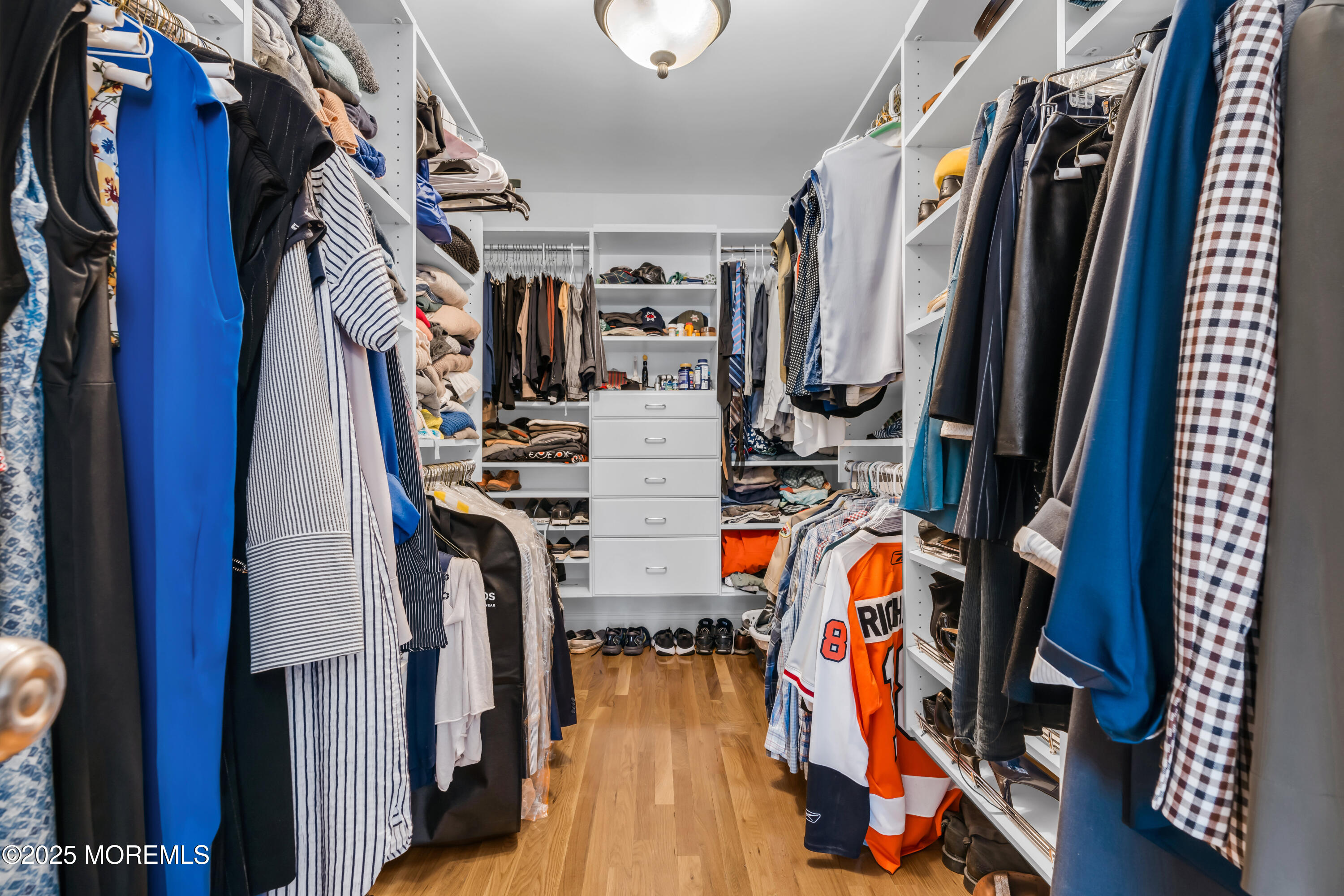 12 Forrest Avenue Rumson, NJ 07760 - Photo 13 of 55 a view of walk in closet with clothes and shoes