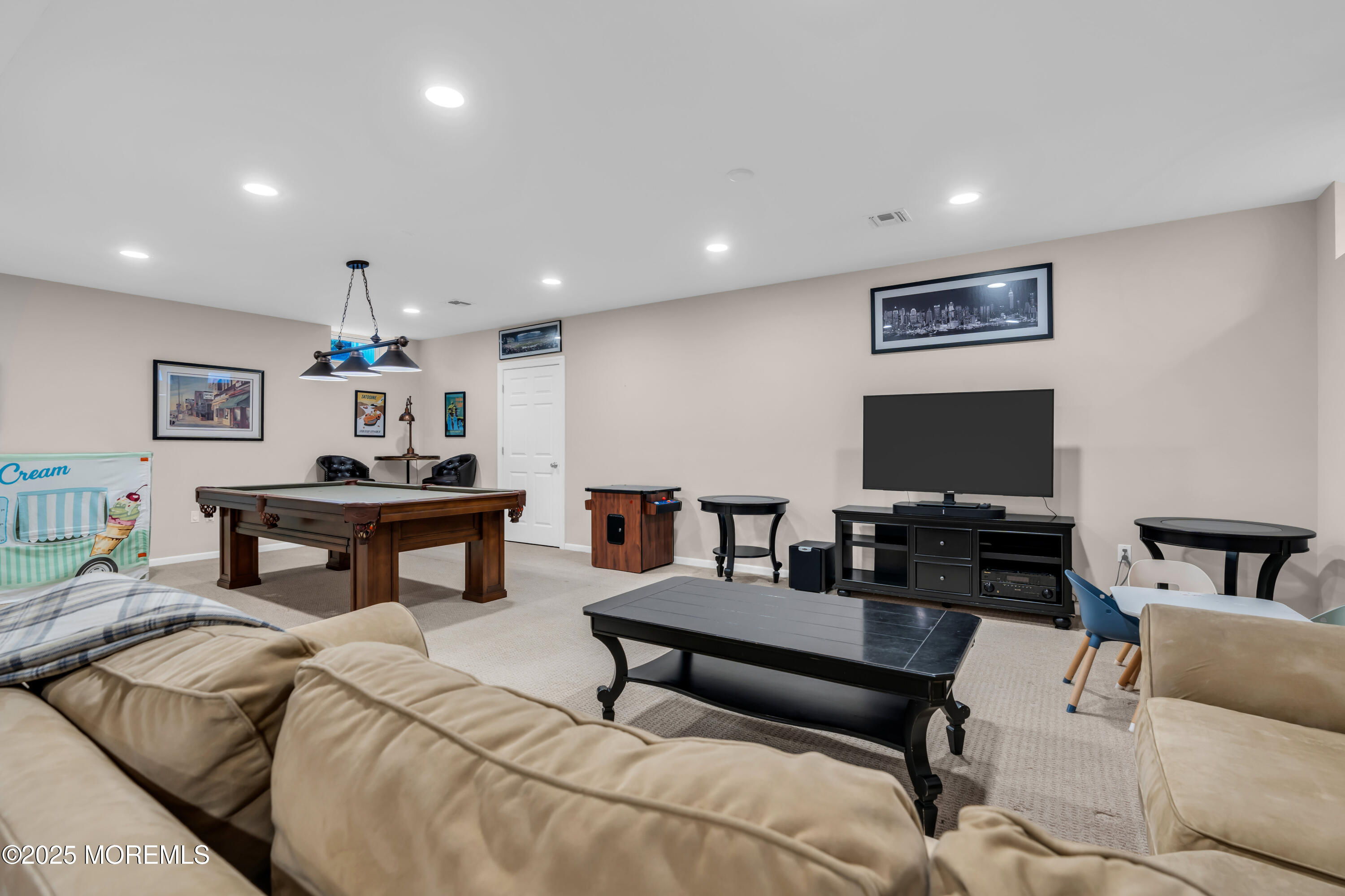 12 Forrest Avenue Rumson, NJ 07760 - Photo 16 of 55 a living room with furniture and a flat screen tv