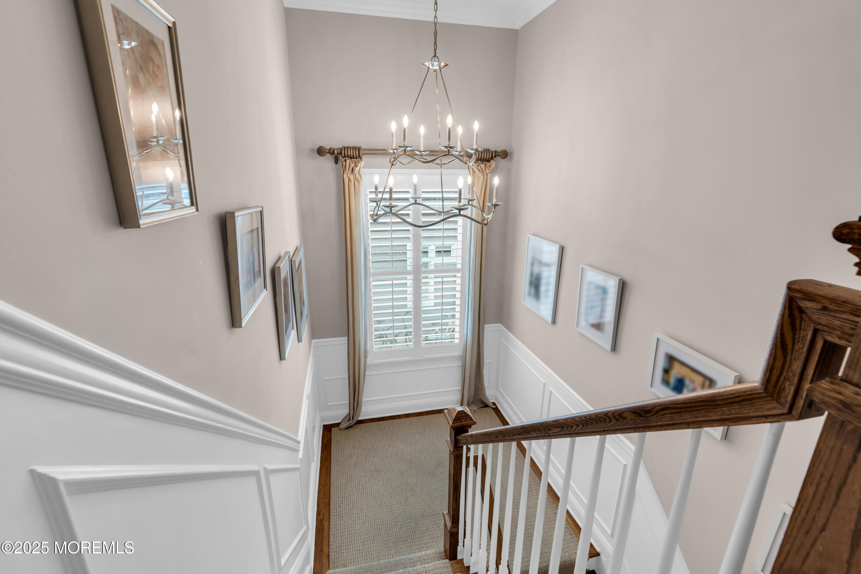 12 Forrest Avenue Rumson, NJ 07760 - Photo 2 of 55 a view of a hallway with windows and chandelier