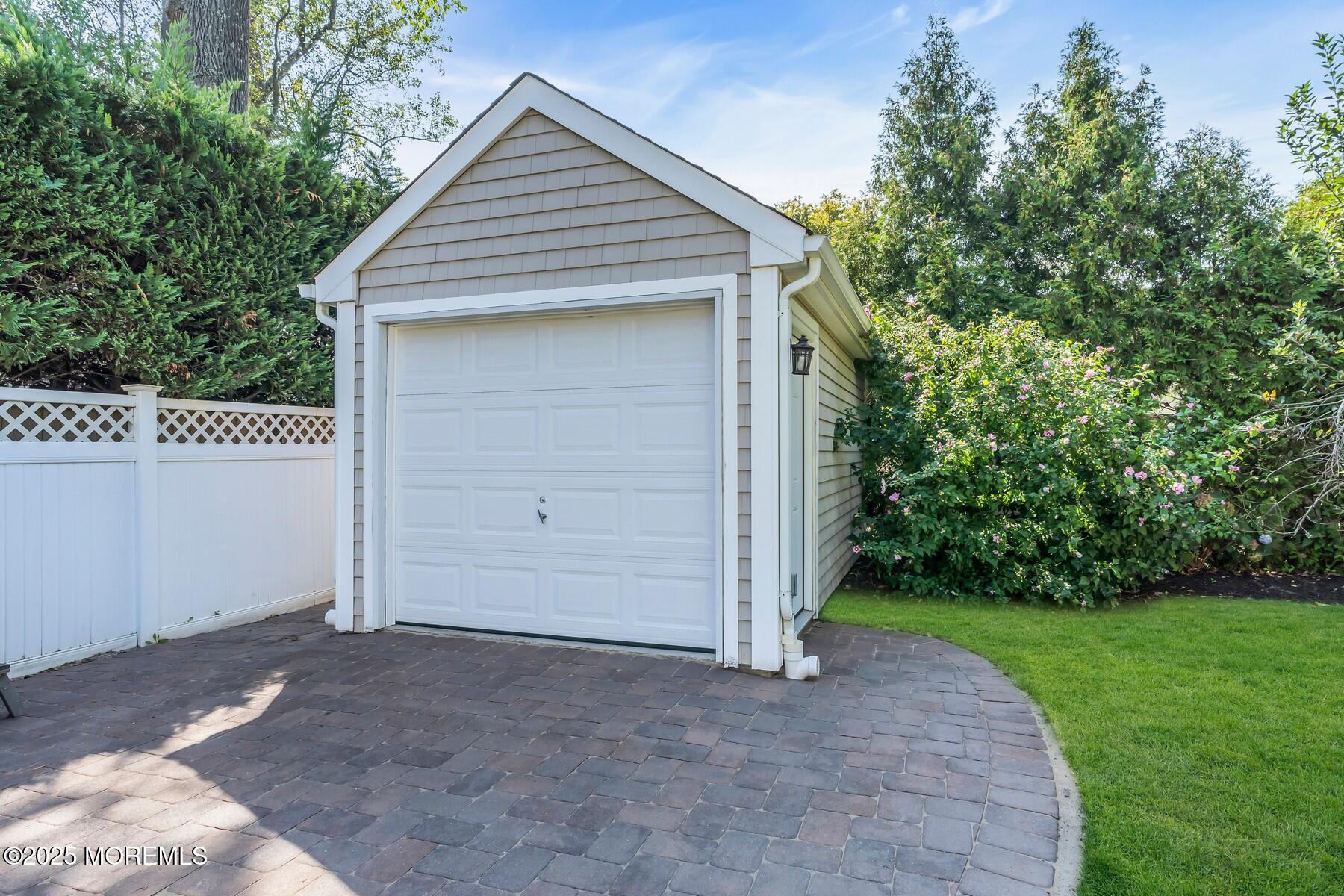 12 Forrest Avenue Rumson, NJ 07760 - Photo 30 of 55 a front view of a house with a yard
