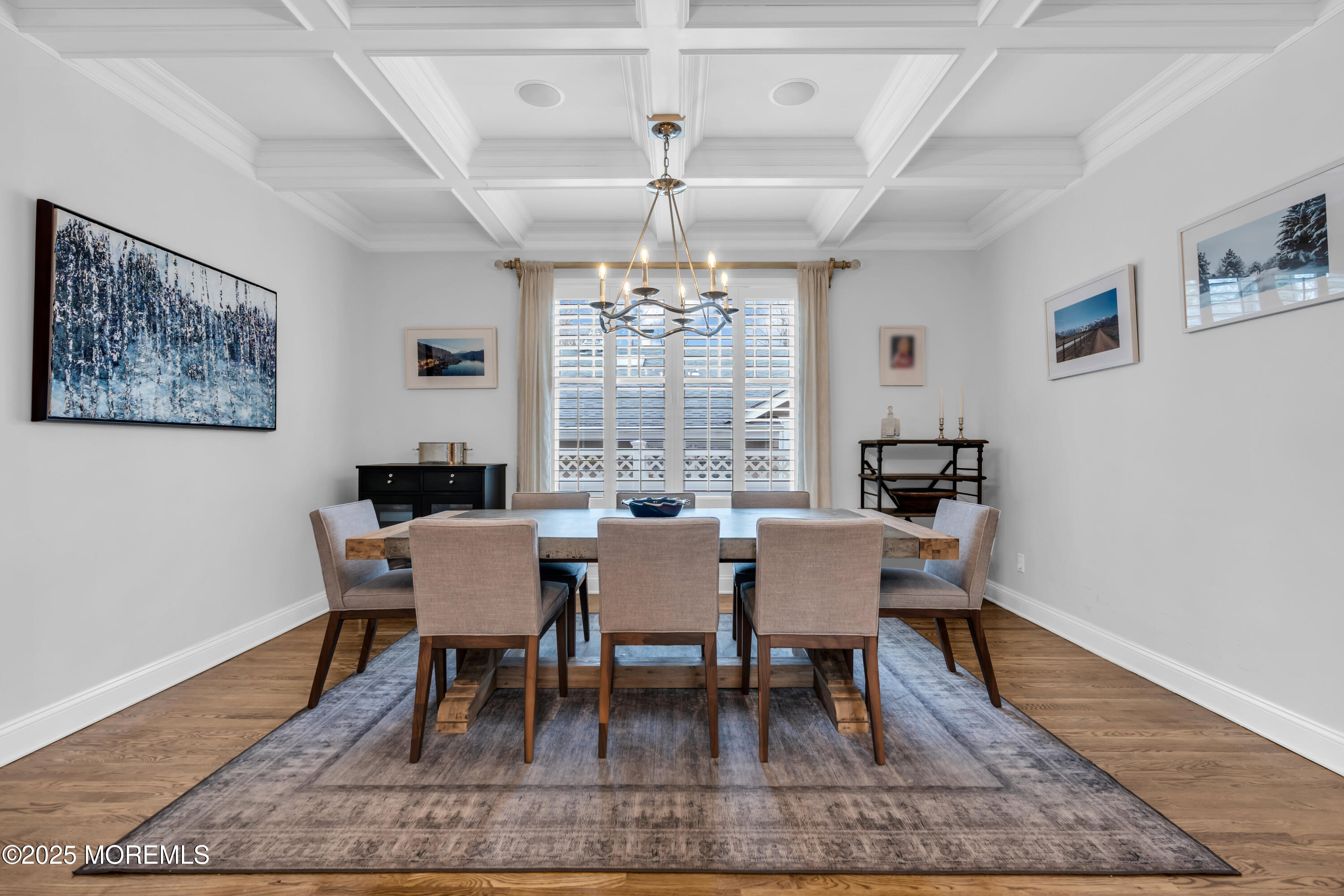 12 Forrest Avenue Rumson, NJ 07760 - Photo 40 of 55 a dining room with wooden floor and a chandelier